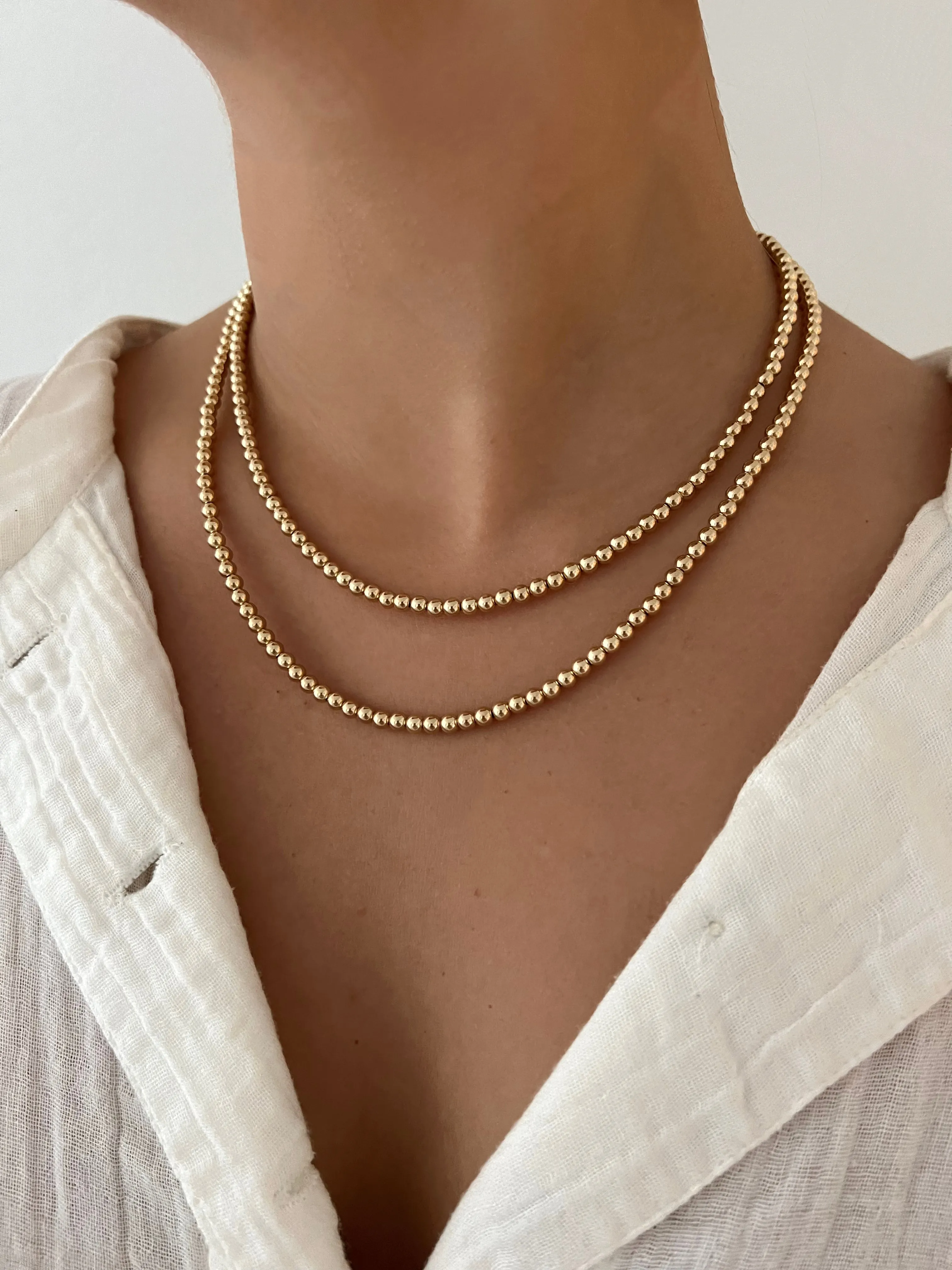 GOLD BALL NECKLACE